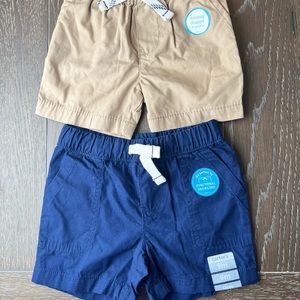 6 pairs of boy shorts. 9m, brand new some with tags still!
